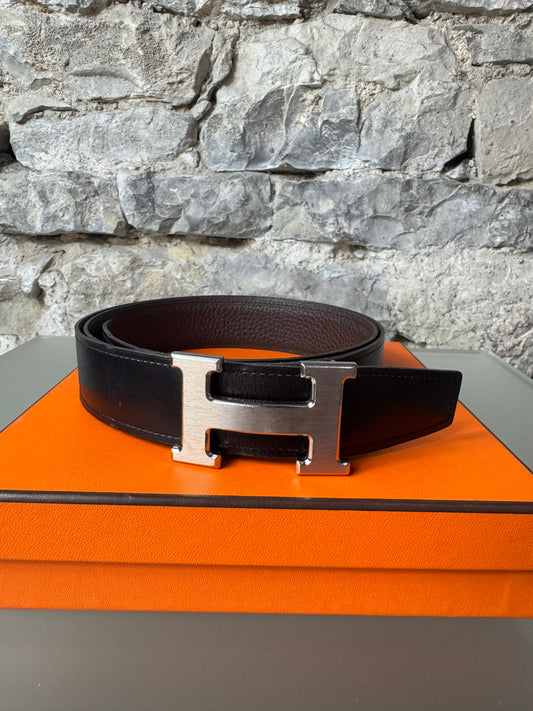 Hermès Wendegürtel – Dunkelbraun/Schwarz mit silberfarbener H-Schnalle