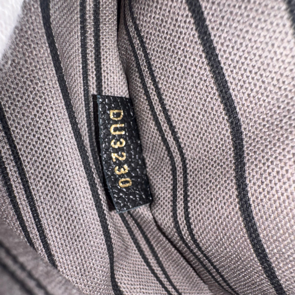 Louis Vuitton Pochette Métis – Monogram Empreinte Leder Schwarz