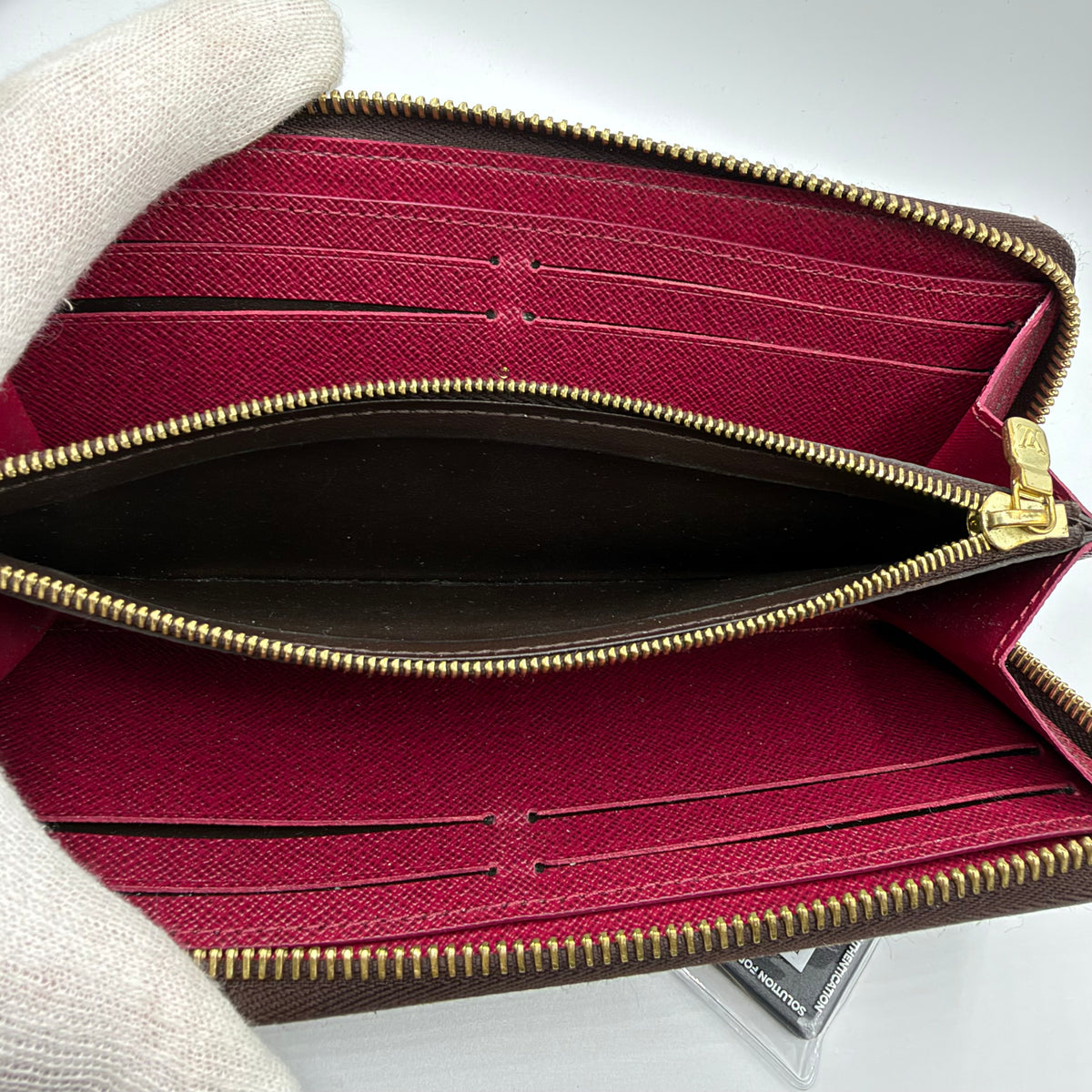 Louis Vuitton Clémence Geldbörse – Monogram Canvas / Fuchsia
