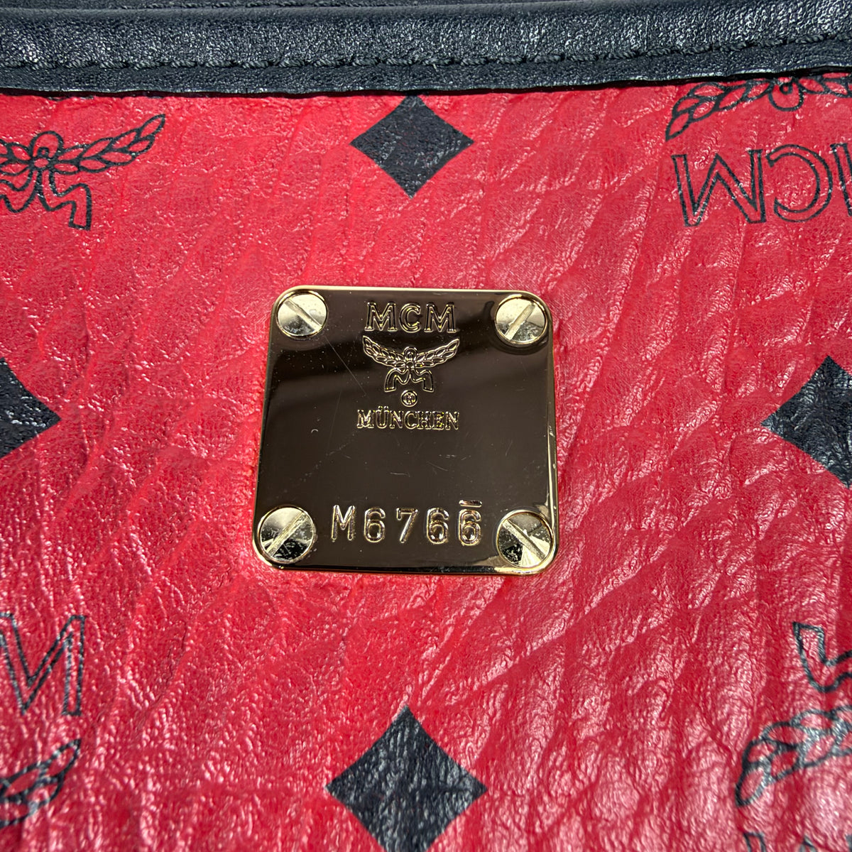 MCM Anya Visetos Wendeshopper – Rot / Schwarz