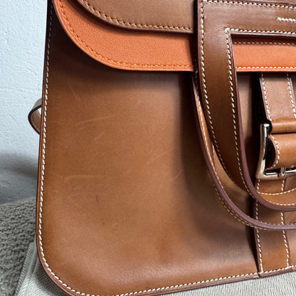 Hermès Halzan 31 Gold Leder