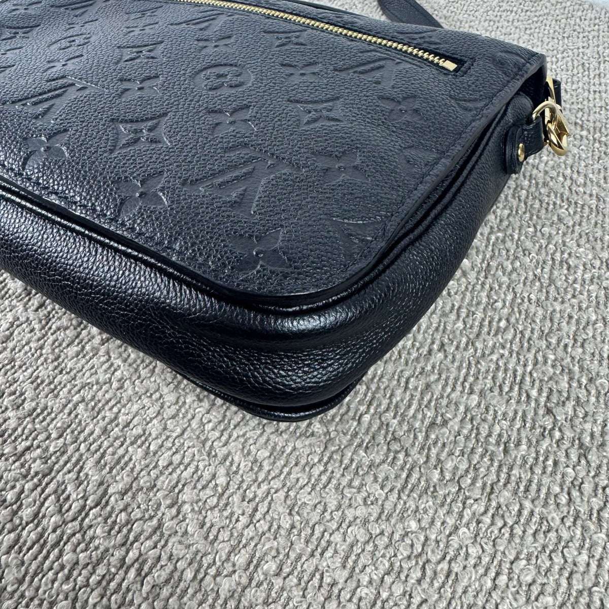 Louis Vuitton Pochette Métis – Monogram Empreinte Leder Schwarz