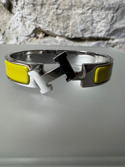Hermès Clic H Armreif – Silber & Gelb