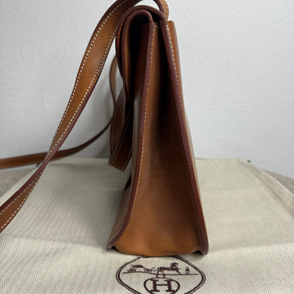 Hermès Halzan 31 Gold Leder