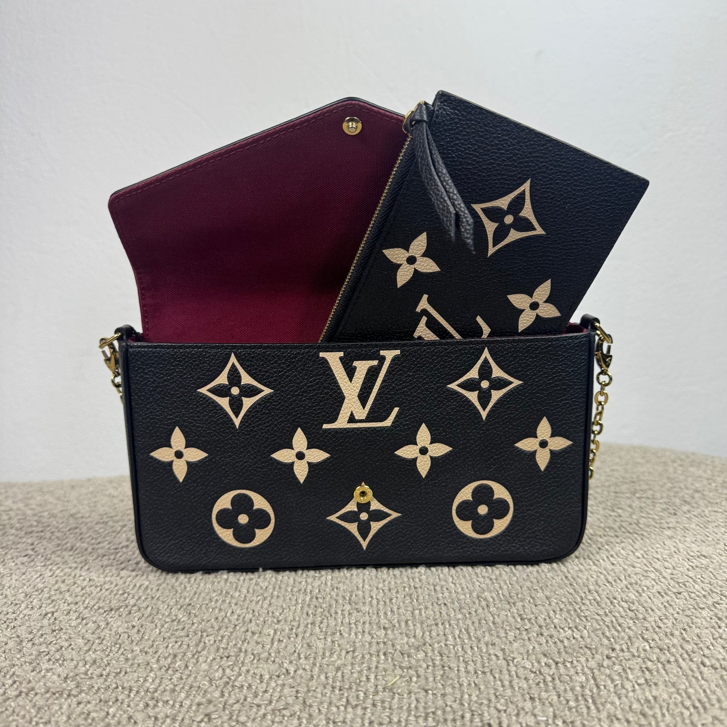 Louis Vuitton Félicie Pochette – Empreinte Leder Schwarz / Beige