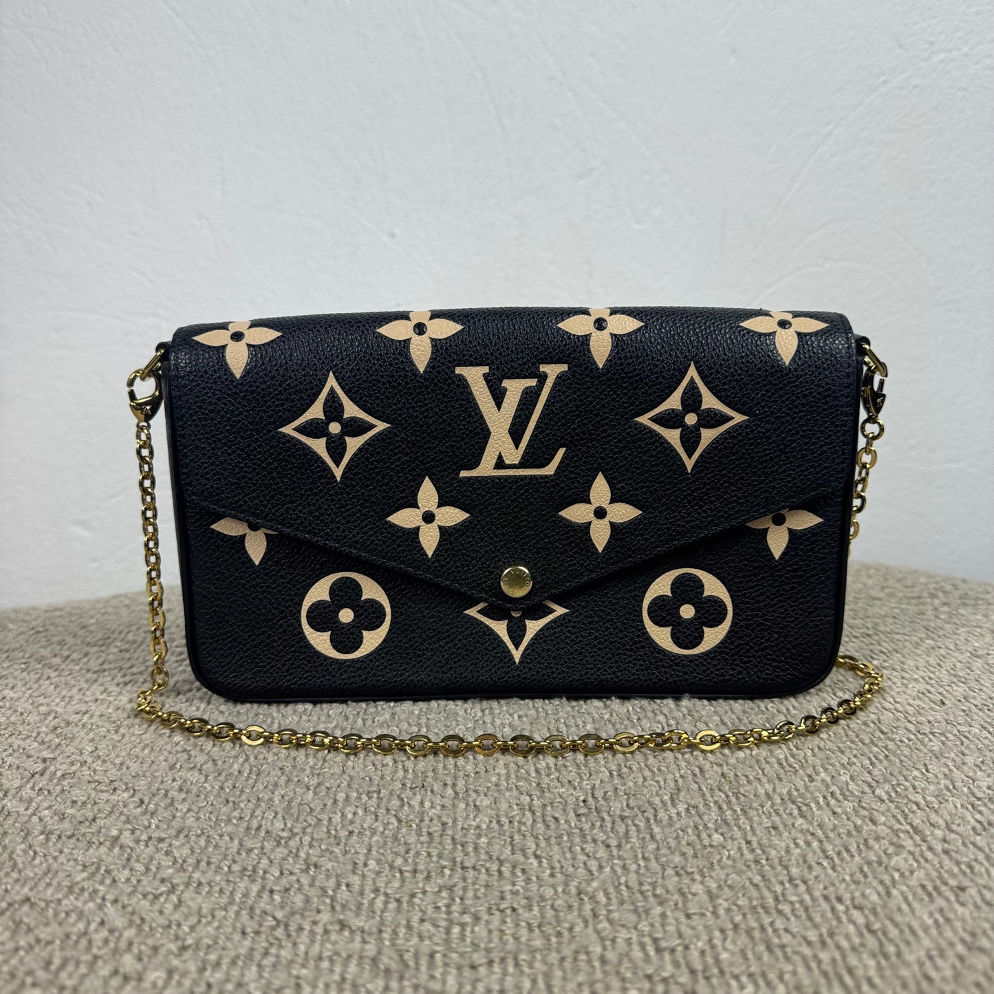 Louis Vuitton Félicie Pochette – Empreinte Leder Schwarz / Beige
