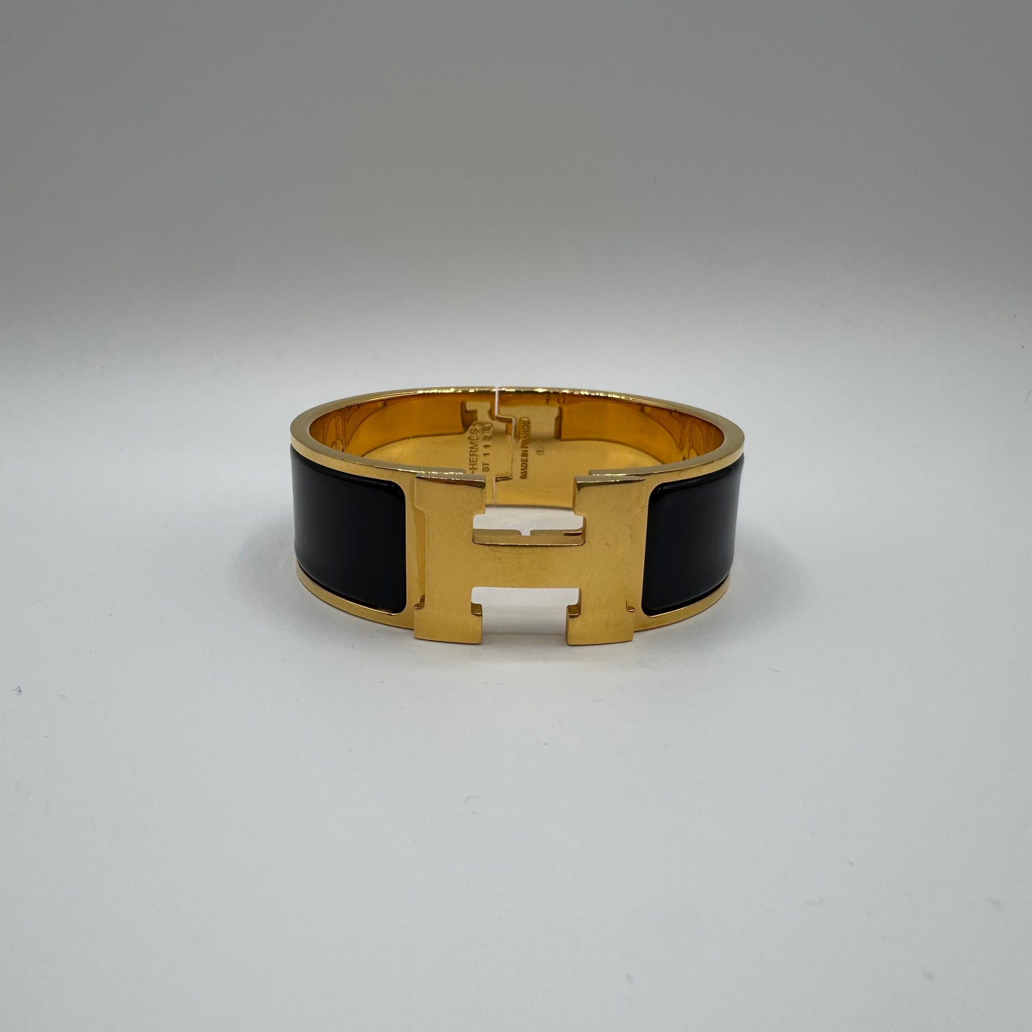 Hermès Clic Clac H Armreif Schwarz Gold GM