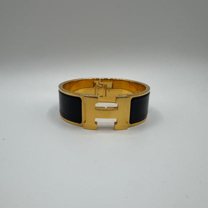 Hermès Clic Clac H Armreif Schwarz Gold GM
