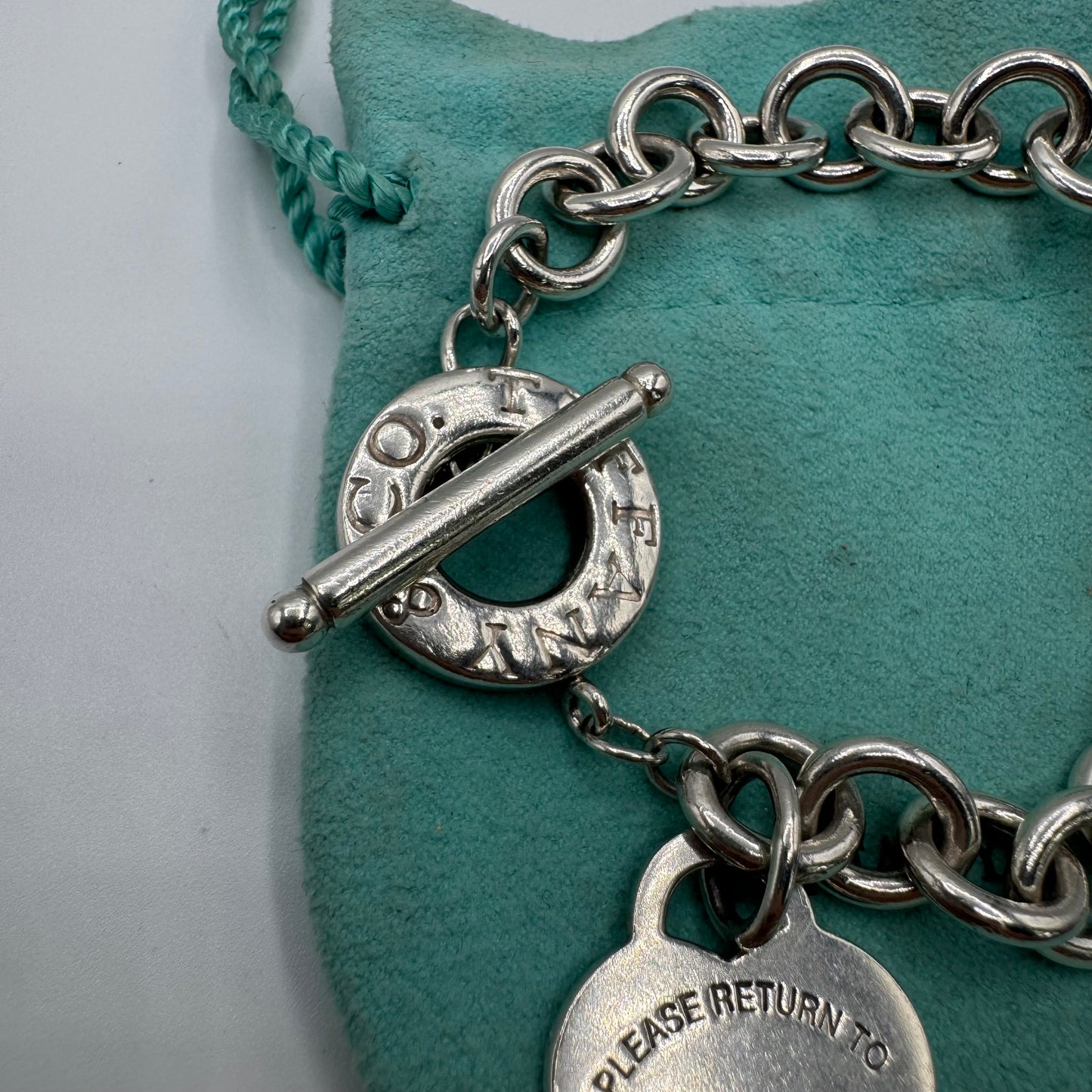 Tiffany & Co. Return to Tiffany Gliederarmband mit Herzanhänger – 925 Silber