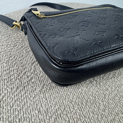 Louis Vuitton Pochette Métis – Monogram Empreinte Leder Schwarz