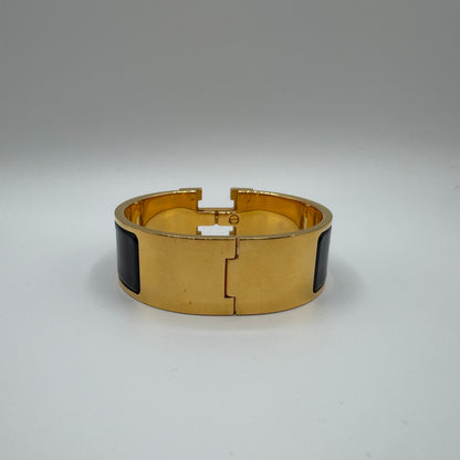 Hermès Clic Clac H Armreif Schwarz Gold GM