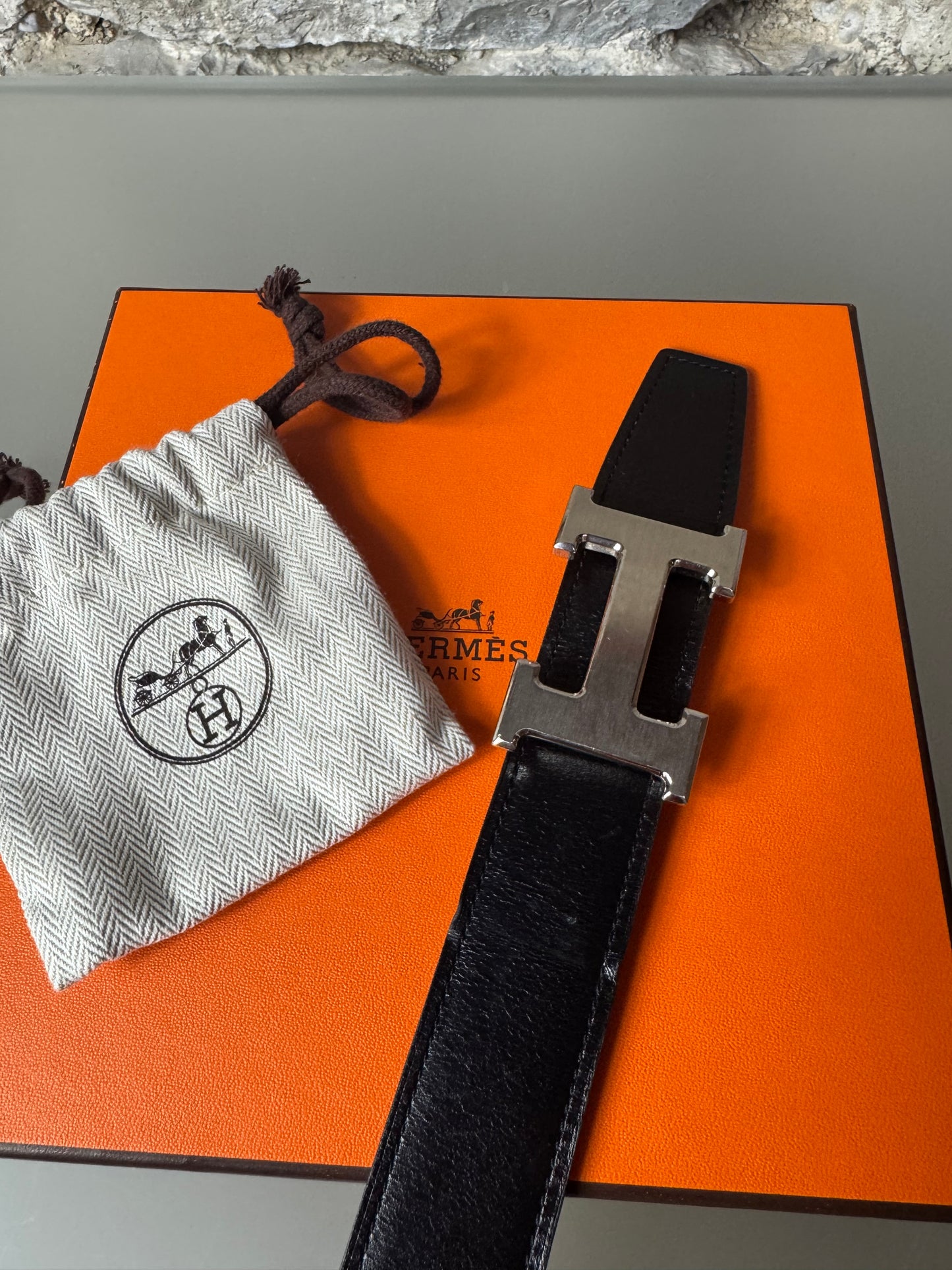 Hermès Wendegürtel – Dunkelbraun/Schwarz mit silberfarbener H-Schnalle