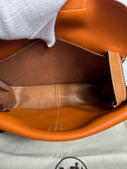 Hermès Halzan 31 Gold Leder
