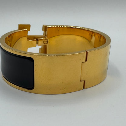 Hermès Clic Clac H Armreif Schwarz Gold GM