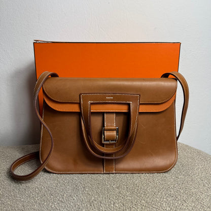 Hermès Halzan 31 Gold Leder