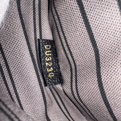 Louis Vuitton Pochette Métis – Monogram Empreinte Leder Schwarz