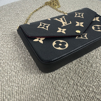 Louis Vuitton Félicie Pochette – Empreinte Leder Schwarz / Beige