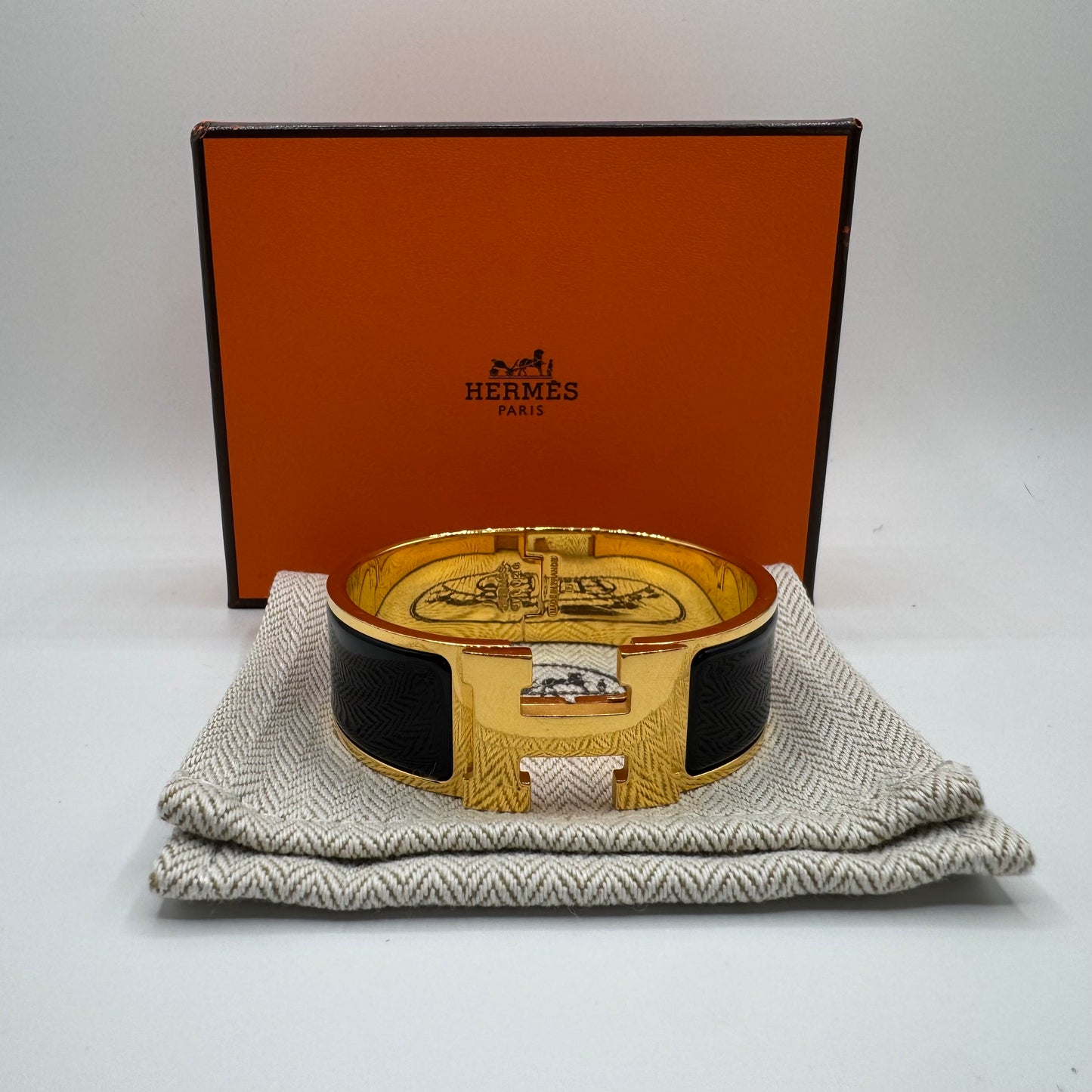 Hermès Clic Clac H Armreif Schwarz Gold GM
