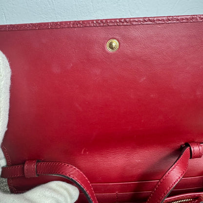 Gucci Microguccissima Geldbörse mit Riemen – Rot