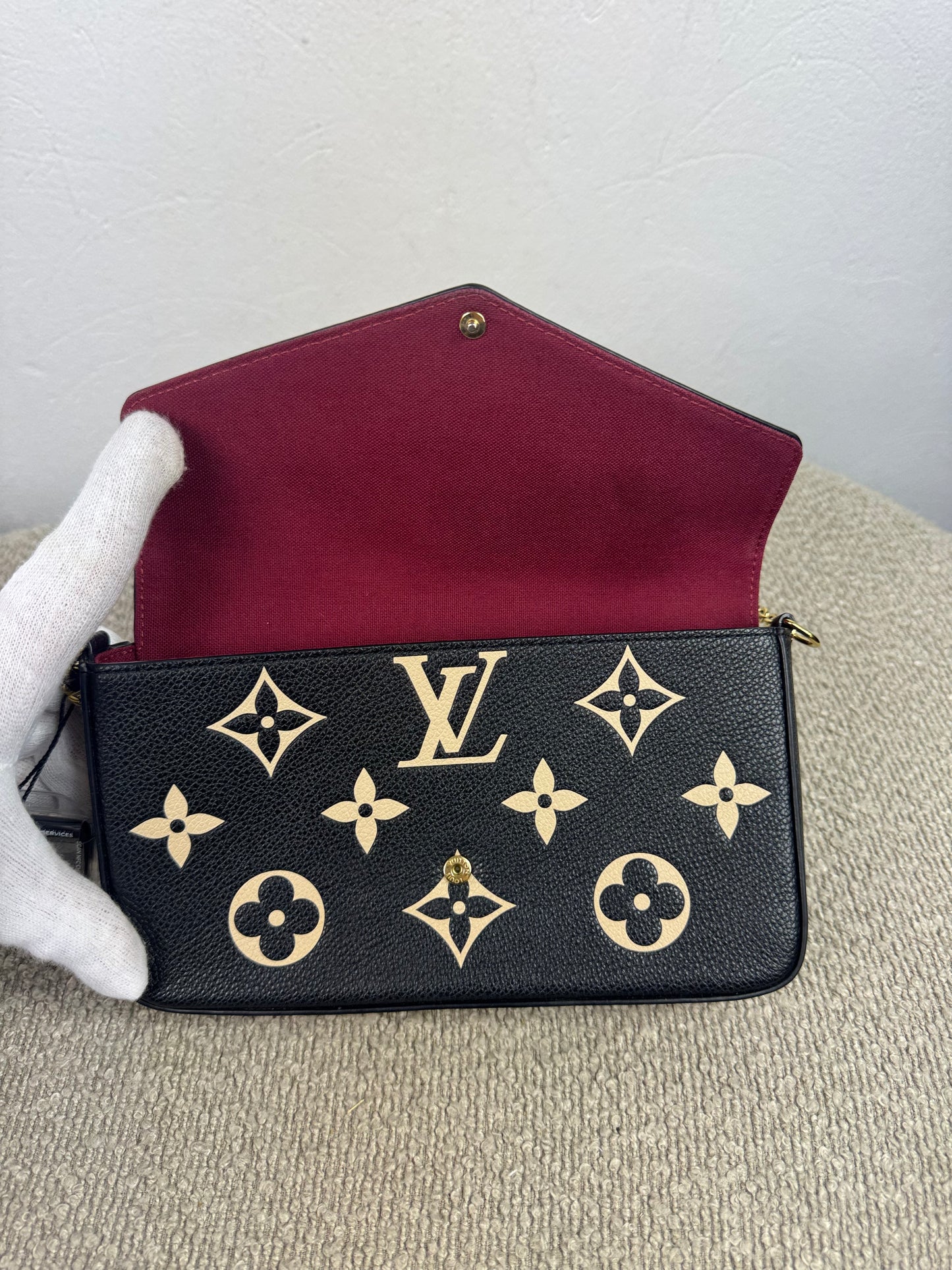 Louis Vuitton Félicie Pochette – Empreinte Leder Schwarz / Beige