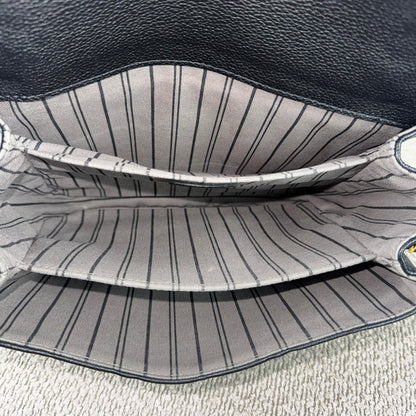 Louis Vuitton Pochette Métis – Monogram Empreinte Leder Schwarz