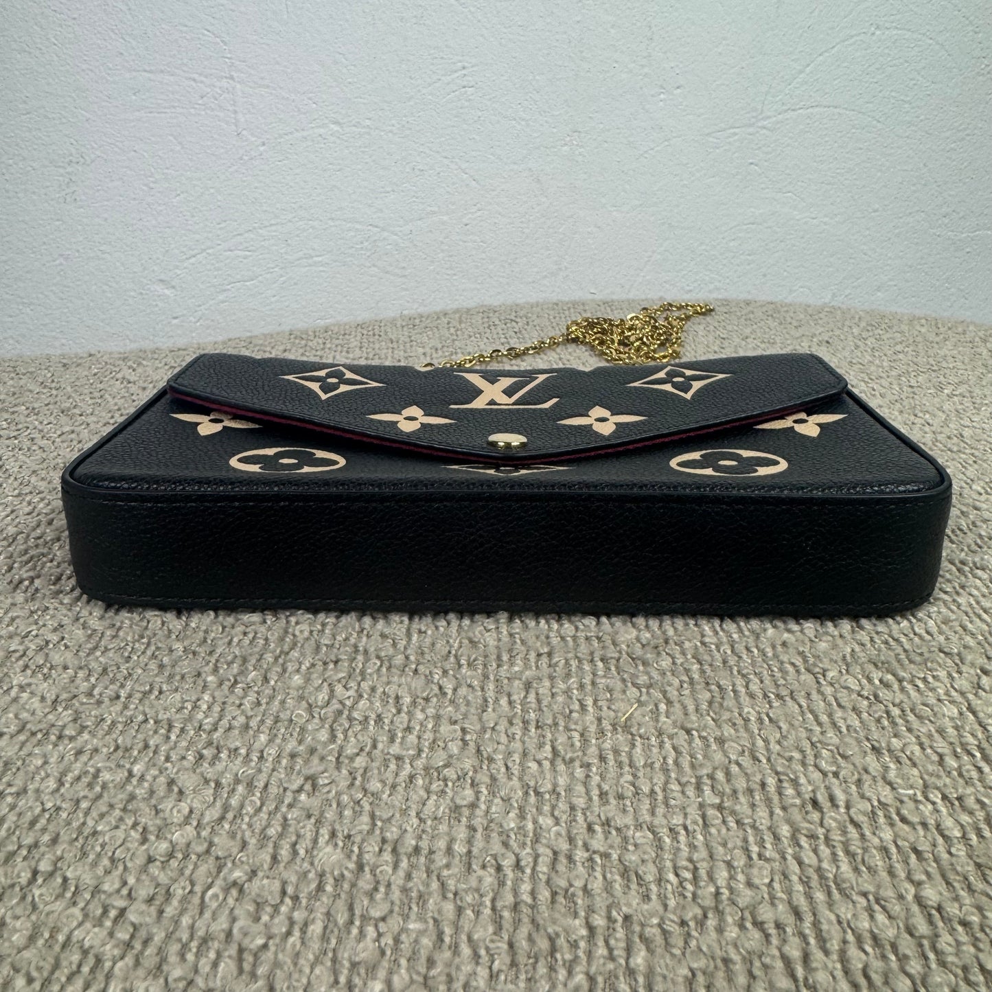 Louis Vuitton Félicie Pochette – Empreinte Leder Schwarz / Beige
