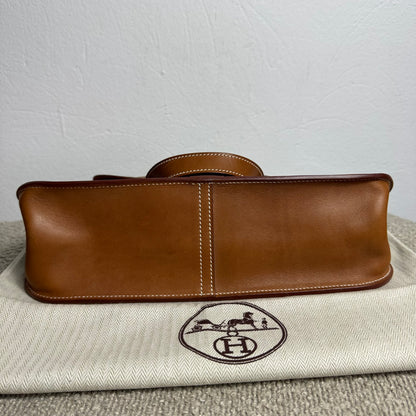 Hermès Halzan 31 Gold Leder