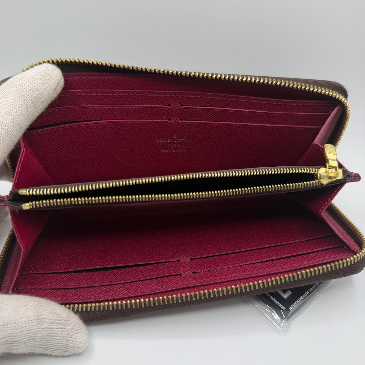 Louis Vuitton Clémence Geldbörse – Monogram Canvas / Fuchsia