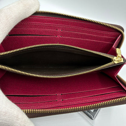 Louis Vuitton Clémence Geldbörse – Monogram Canvas / Fuchsia